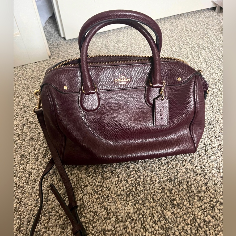 Burgundy over the shoulder, small handle coach purse